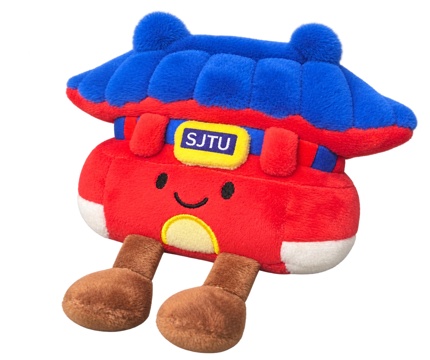 A cute plush toy of a traditional Chinese building with SJTU badge