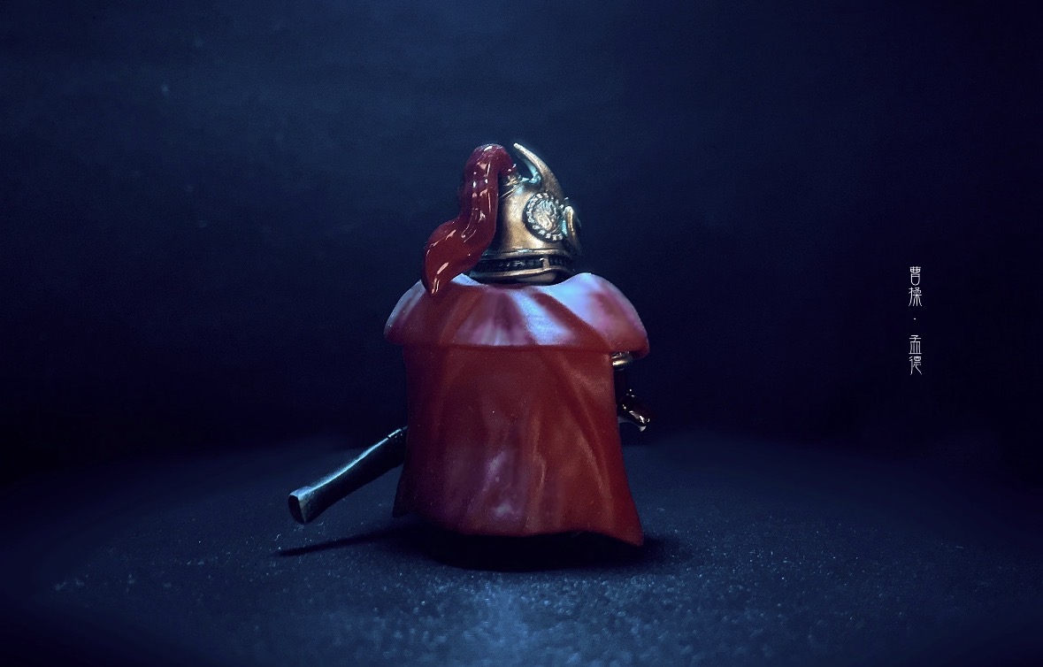 A warrior figure viewed from behind