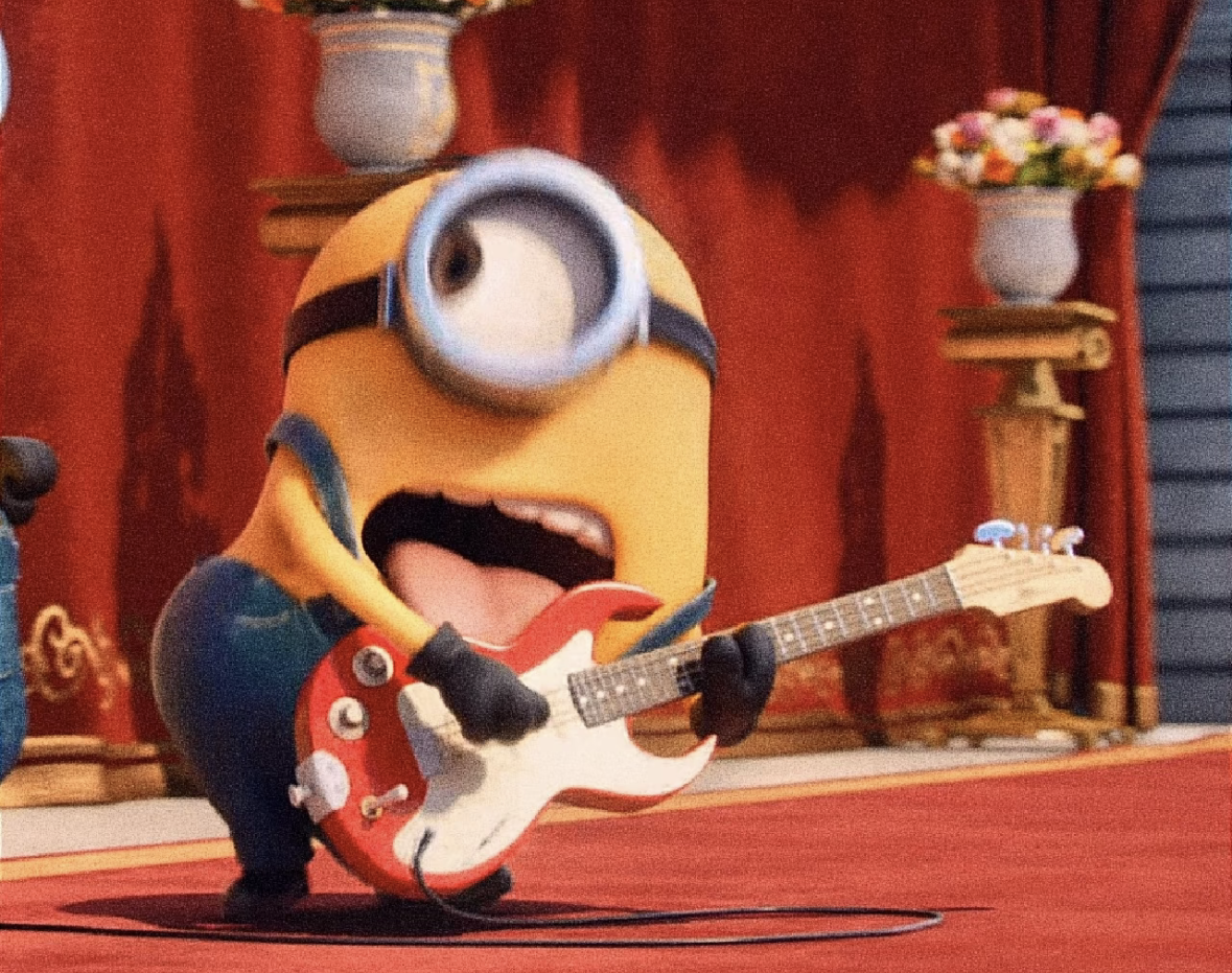 Stuart playing guitar for a birthday celebration